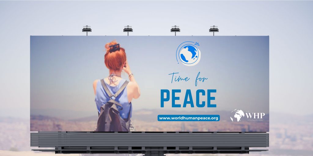 A billboard displaying a rear view of a person with red hair tied up, wearing a blue top and backpack, looking out over a blurred cityscape. The text on the billboard reads 'Time for PEACE' in a mix of cursive and bold fonts. Above the text is a globe icon with a small airplane circling it. The bottom of the billboard includes the website 'www.worldhumanpeace.org' and the logo for 'The WHP Foundation.