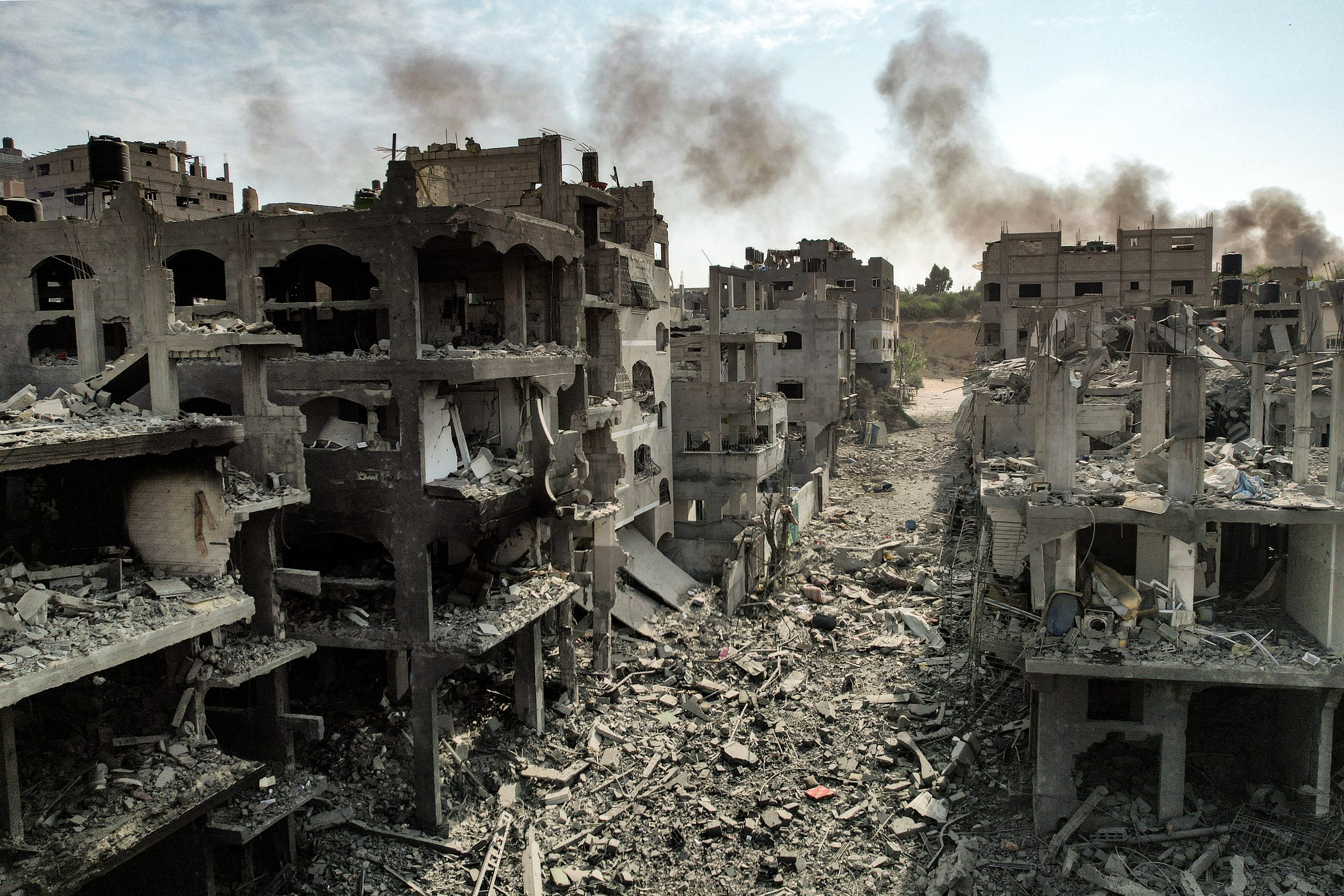 Jabalia: damaged buildings and smoke