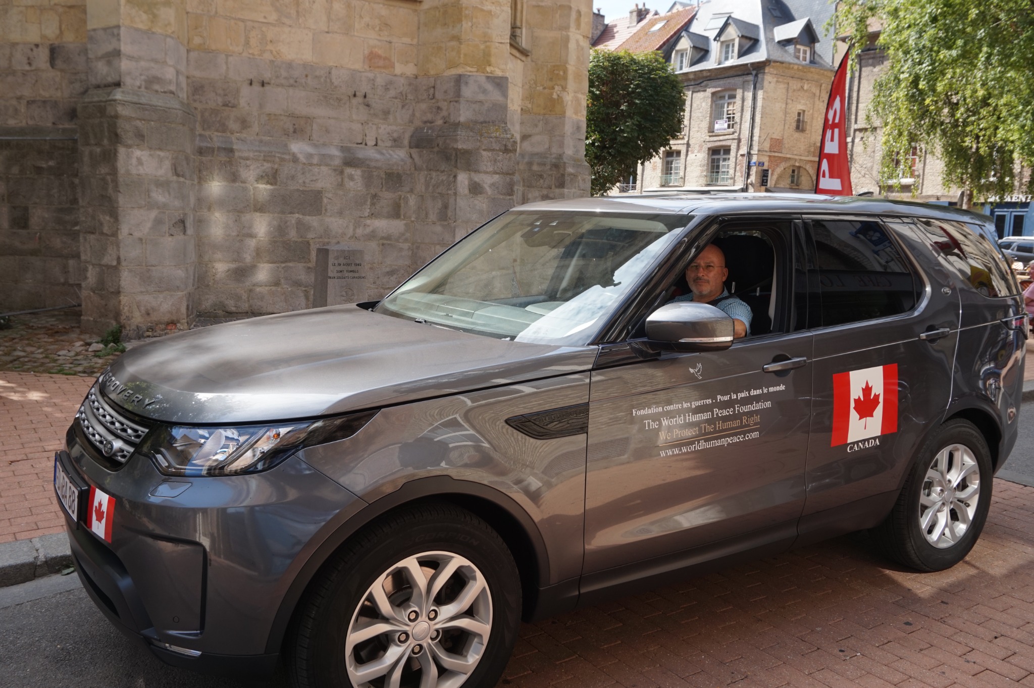 Francisco Armani in the Foundation's marked Land Rover in Dieppe, France