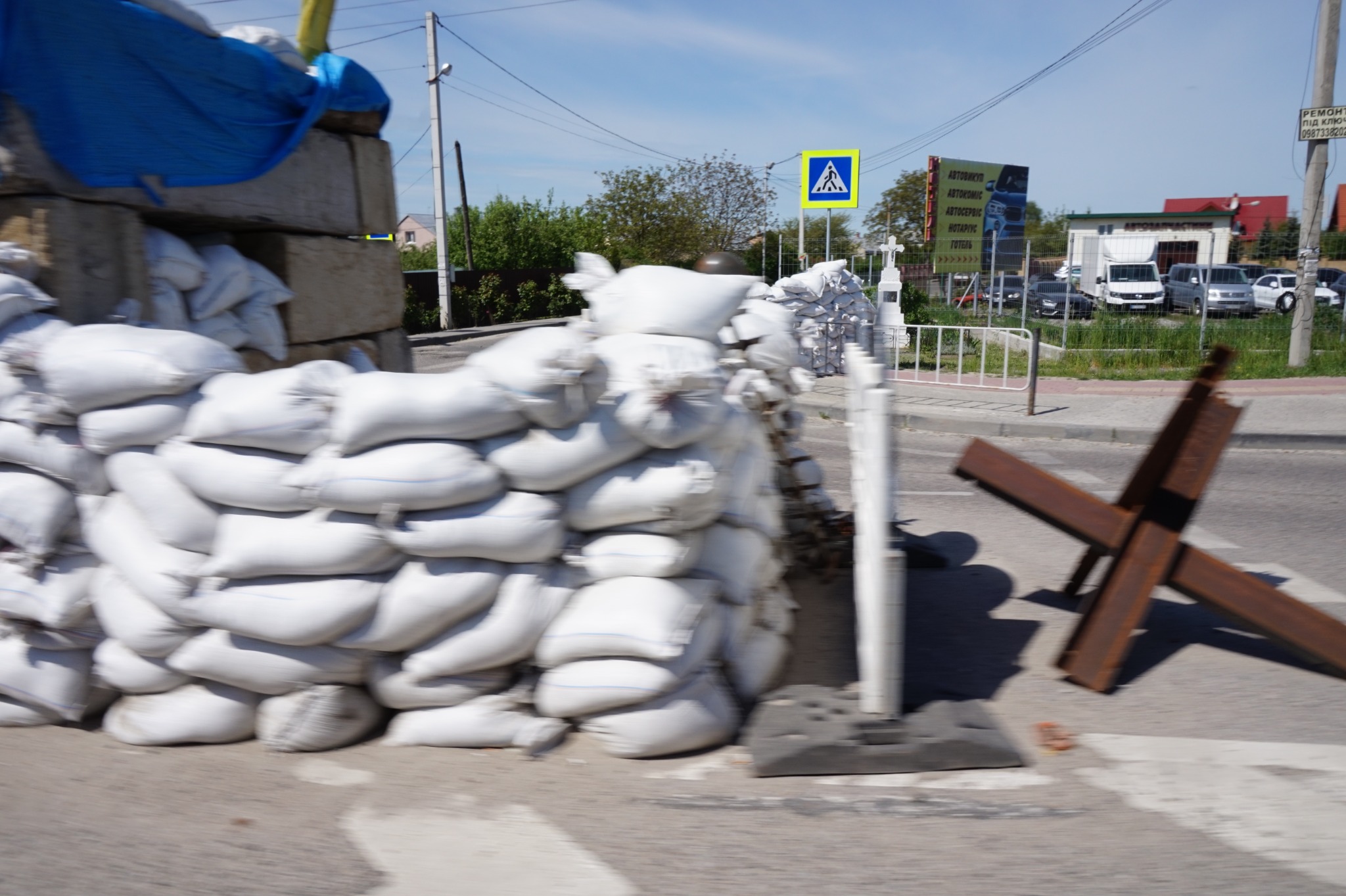 Sandbags and roadside barriers in Ukraine.